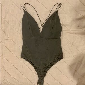 Green plunging v neck body suit